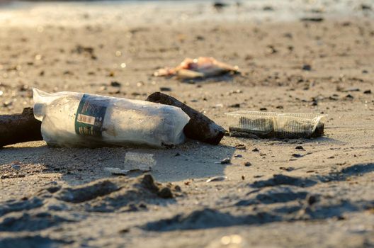 Batu Maung, Penang/Malaysia - Dec 31 2019: Plastic container, bottle is contamination to beach.