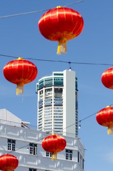 Georgetown, Penang/Malaysia - Jan 03 2020: Red lantern at heritage town. Background is KOMTAR building.