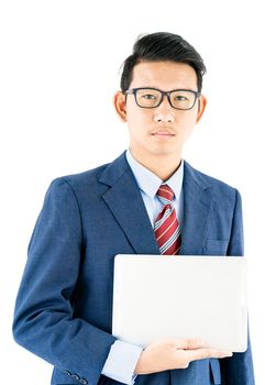 Young asian businessman portrait in suit and wear glasses holding a laptop over white background