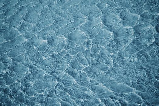 Surface of blue sea water with ripples. Water surface background, texture.