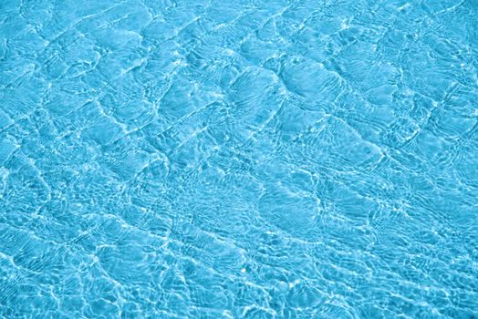 Surface of blue sea water with ripples. Water surface background, texture.