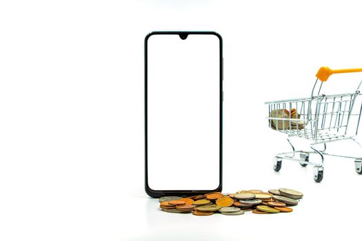 close up shopping cart coin smartphone white background concept e-commerce And the digital market runs an online business. Stay home with copy space