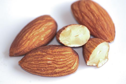 Almonds Delicious. Almonds isolated on white background.