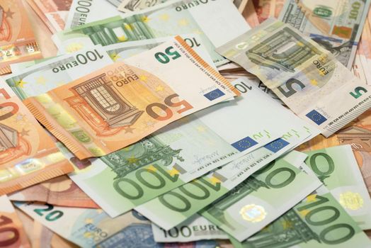 Background of dollar, euro banknotes laying on a table