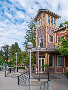 Historical building with playground and waterpark in front.