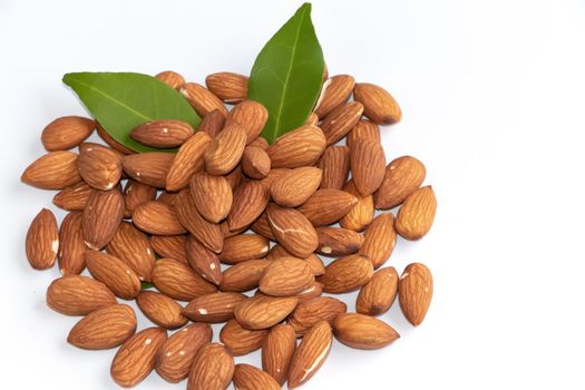 Almonds Delicious. Almonds isolated on white background.