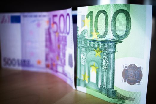 500 and 100 euros in official banknotes. No people