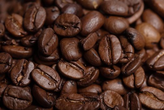 Fresh brown roasted coffee beans background