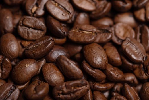 Fresh brown roasted coffee beans background