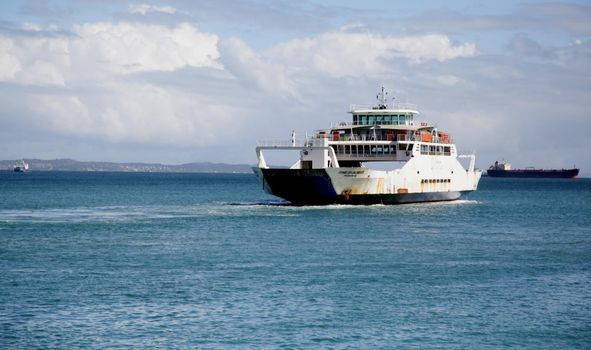 salvador, bahia, brazil - june 28, 2021: Ferry Boat Zumbi dos Palmares seen during approach at Terminal de Sao Joaquim in Salvador city, after crossing Todos os Santos Bay.
