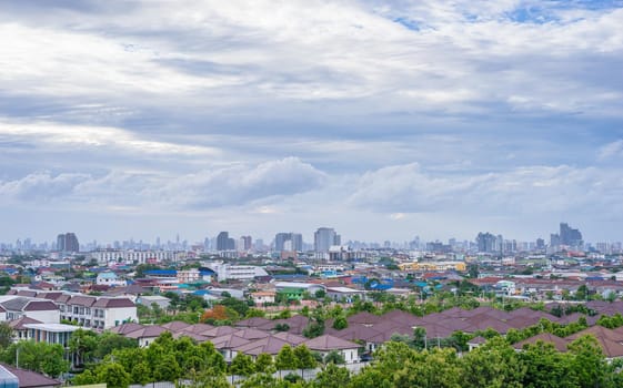 Cityscape and cloudy sky at evening time