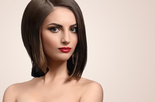 Elegant sensuality. Close up studio portrait of a beautiful young short haired woman wearing red lipstick copyspace beauty skincare hair cosmetics fashion style concept