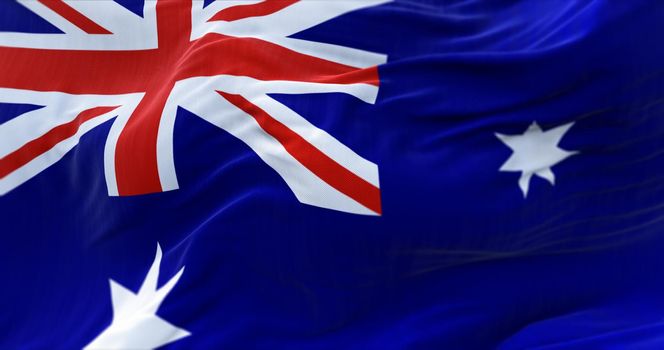 Detail of the national flag of Australia flying in the wind. Democracy and politics. Australia is a Federal parliamentary constitutional monarchy