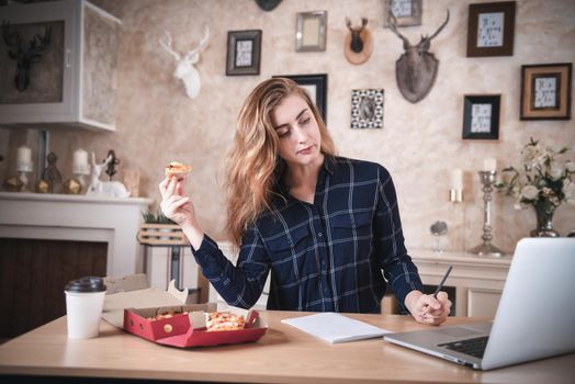 Busy Businesswoman Work at Home While Working on Table Desk With Laptop at The Same Time She Eating, Business Woman Entrepreneur Work From Home With Serious Communicating Busy Tasking. Work Lifestyles