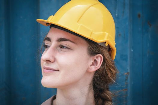 Portrait of Confident Transport Engineer Woman in Safety Equipment Standing in Container Ship Yard. Transportation Engineering Management and Container Logistics Industry, Shipping Worker Occupation
