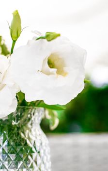 Wedding decoration, table decor and floral beauty, bouquet of white roses in luxury restaurant, beautiful flowers from summer garden.