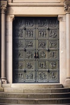 Historic Ancient Metal Door of Architecture Castle Church, Cathedral Exterior Decoration of Swiss Culture in Switzerland. Gate Double Doors Historical and Beautiful Architectural Medieval