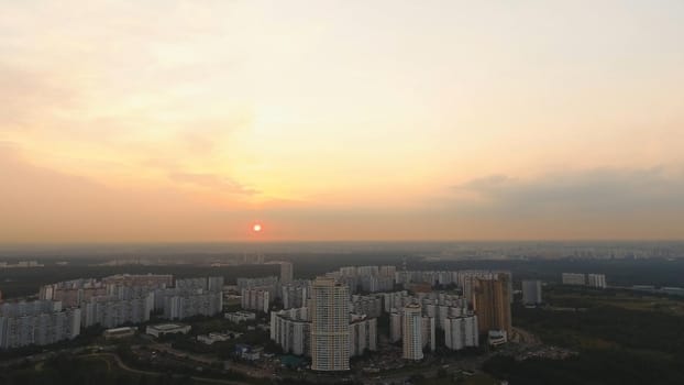 Aerial view Moscow Skyline of big city full of skyscrapers at sunset. Urban landscape of large cities with modern buildings.