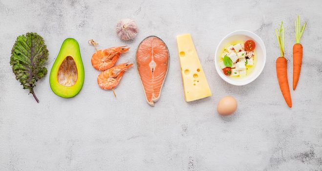 Ketogenic low carbs diet concept. Ingredients for healthy foods selection set up on white concrete background.