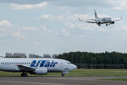 July 2, 2019, Moscow, Russia. Airplane Boeing 737-500 UTair Aviation Airlines at Vnukovo airport in Moscow.