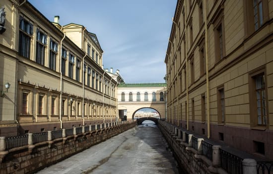 Ancient buildings on the banks of the Zimnyaya Kanavka canal in St. Petersburg.