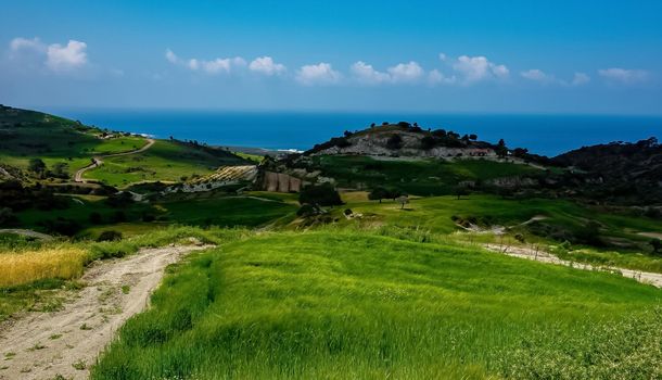 Water meadows and hills on the Mediterranean coast on the island of Cyprus.