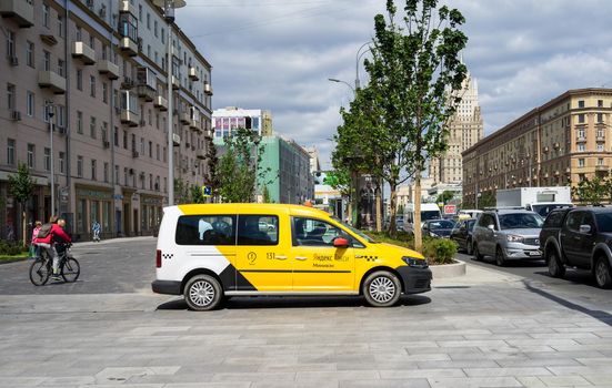 May 31, 2018, Moscow, Russia. Yandex Taxi minivan on the Garden Ring in Moscow.