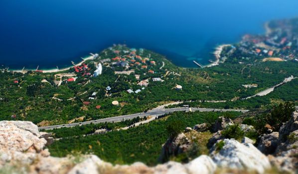 View of the South Coast Highway from the height of the Yalta Yaila in Crimea. Shift Lens Effect