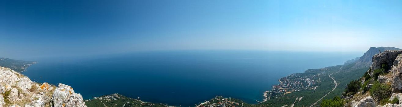 View of the Black Sea coast from a high cliff of the South Coast of Crimea.