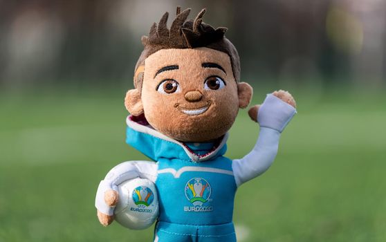 April 16, 2021 Moscow, Russia. Soft toy mascot of the European Football Championship 2020 Skillzy on the green grass of the lawn of the football stadium.