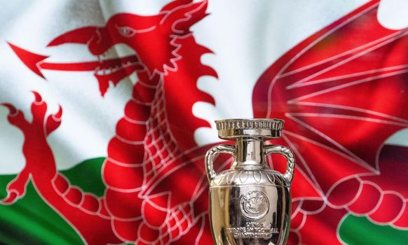 April 10, 2021. Cardiff, Wales. UEFA European Championship Cup with the Wales flag in the background.