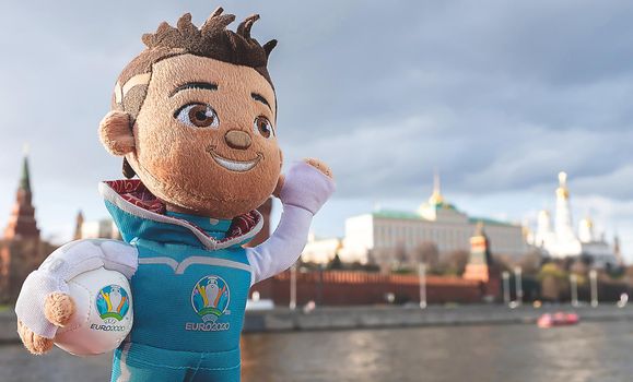 April 25, 2021, Moscow, Russia. The mascot of the European Football Championship 2020 Skillzy against the backdrop of the Moscow Kremlin.