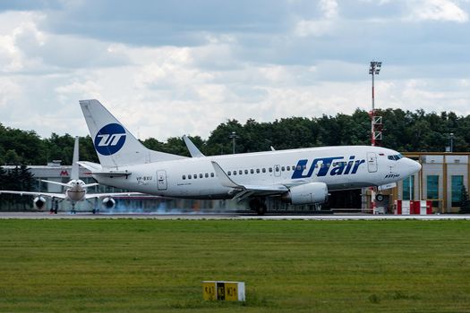 July 2, 2019, Moscow, Russia. Airplane Boeing 737-500 UTair Aviation Airlines at Vnukovo airport in Moscow.