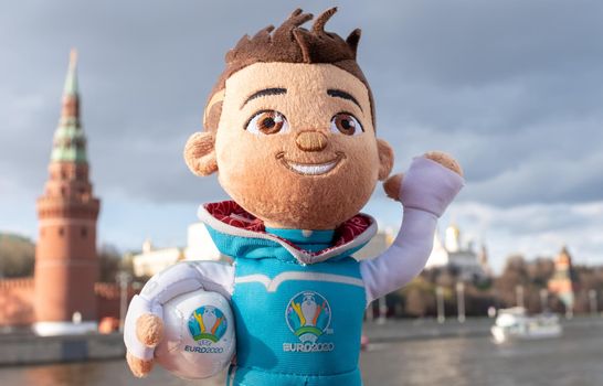 April 25, 2021, Moscow, Russia. The mascot of the European Football Championship 2020 Skillzy against the backdrop of the Moscow Kremlin.