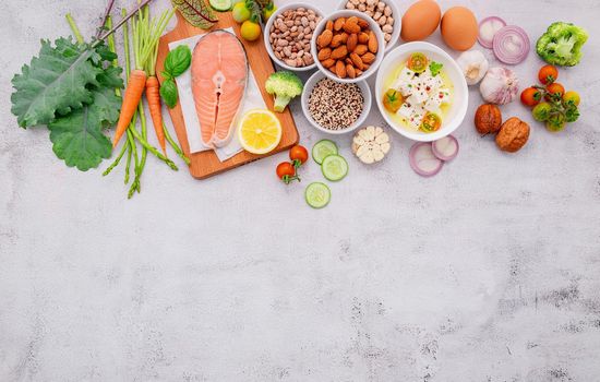 Ketogenic low carbs diet concept. Ingredients for healthy foods selection set up on white concrete background.