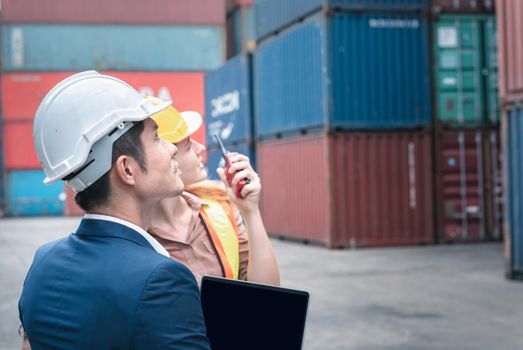 Container Shipping Logistics Engineering of Import/Export Transportation Industry, Transport Engineers Teamwork Controlling Management Containers Together at Port Ship Loading Dock. Business Team