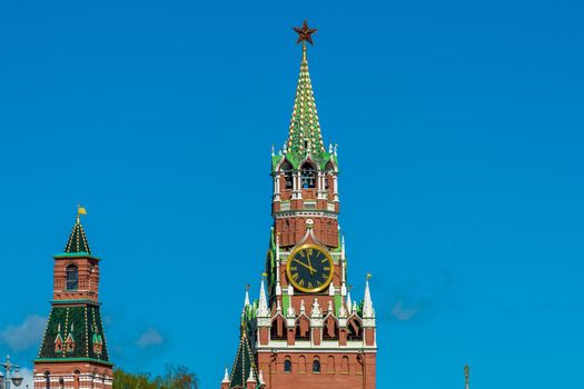 Clock on the Spasskaya Tower of the Moscow Kremlin on a clear sunny day