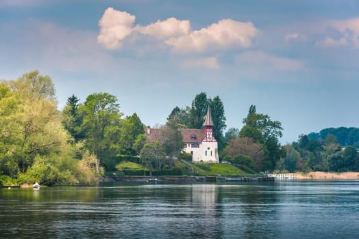 Natural Scenery and Swiss Church Culture at Stein Am Rhein City, Switzerland. Beautiful Nature Waterfront View of Rhine River With Architecture Historical Church Building at Summer. Travel Destination