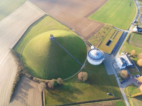 Aerial view of The Lion's Mound with farm land around. The immense Butte Du Lion on the battlefield of Waterloo where Napoleon died. Belgium.