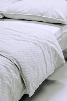 Close up image of Bed mattress Duvet with pillow and blanket