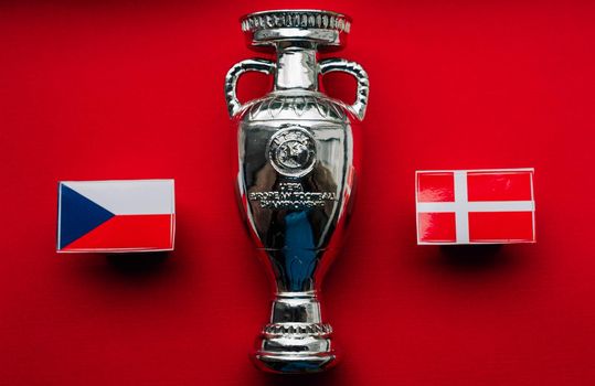 July 1, 2021 Baku, Azerbaijan. Flags of the Czech and Danish European Football Championship quarterfinals participants against the backdrop of the Euro 2020 Cup.