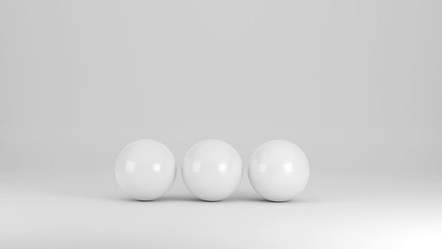 Three white spheres on a white background as 3D rendering