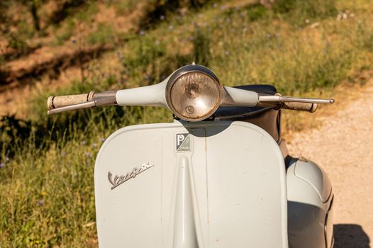 terni ,italy JULY 02 2021 :front light vespa 50 special vintage piaggio