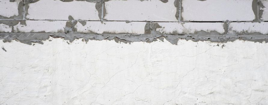 Old grungy grey concrete wall as a texture