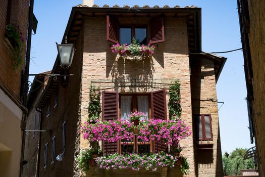 View of the characteristic alleys of the famous town of Pienza, Tuscany, Italy