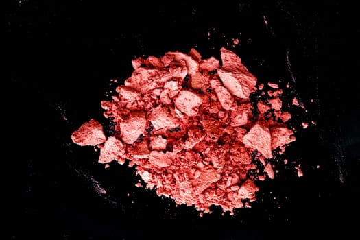 Crushed cosmetics, mineral organic eyeshadow, blush and cosmetic powder isolated on black background, makeup and beauty banner, flatlay design.