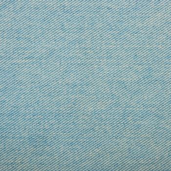 Light blue washed cotton jeans denim texture background, close up
