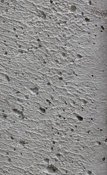 Background texture of uneven light gray concrete surface