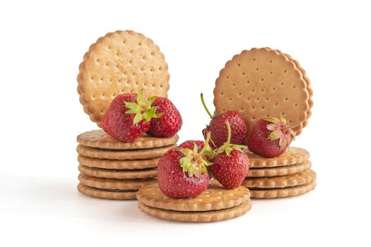 Cookies and berries of a ripe lover. Items isolated on white background. Stock photography.