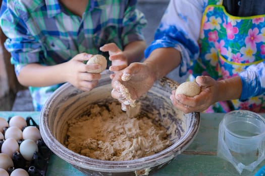 people make salted egg in hand